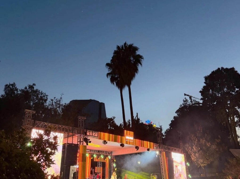 Twilight Outdoor Concert — Rigged LED screens and stage structure for a live outdoor show